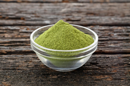 Moringa oleifera - Green and natural moringa powder in a bowlの写真素材