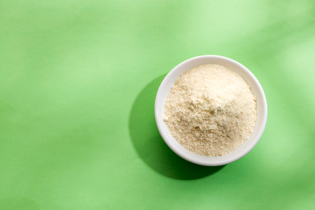 Hydrolyzed collagen powder in the bowl - Organic gelatin powderの写真素材