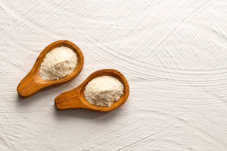 Collagen protein in two spoons - Organic gelatin powderの写真素材