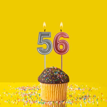 Birthday on a yellow background - Number 56 candle