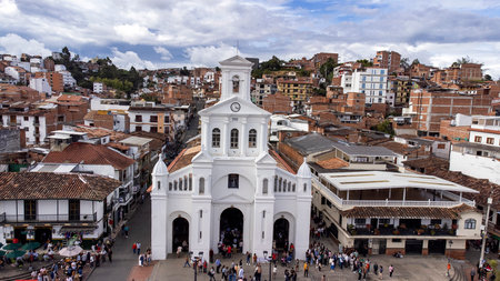 Marinilla, Antioquia, Colombia. June 1, 2025. Catholic parish located in the main park of the municipalityの写真素材