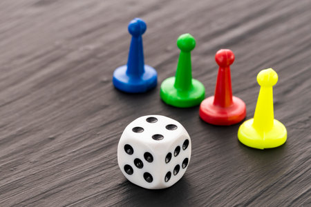 Board game pieces and dice - Dark background