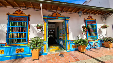 Guatape, Antioquia, Colombia. August 12, 2025. It is one of the most colorful towns in Colombia, it reflects it in the form of baseboards and streets full of life.の写真素材