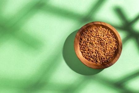 Natural aromatic fenugreek seeds in bowl - Natural foodの写真素材