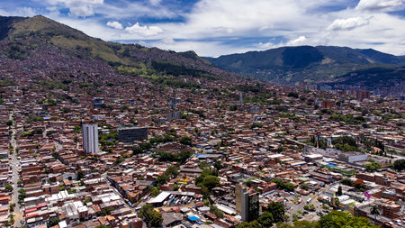 Medellin, Antioquia, Colombia. September 15, 2025. Panoramic drone view of the Manrique neighborhood, Commune 3の写真素材