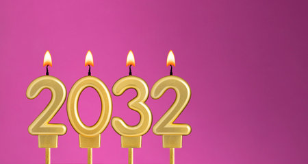 Happy New Year 2032 - Candles in the form of lit numbersの写真素材