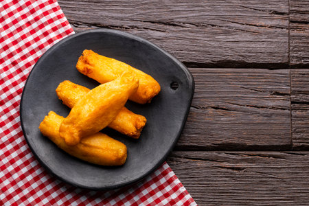 Typical Colombian fried carimaÃ±ola - Cassava balls filled with meat and cheeseの写真素材
