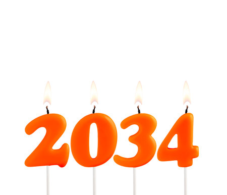 Happy New Year - Candles in the form of lit numbersの写真素材