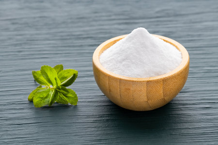 Leaves of the stevia plant - Bowl with stevia powderの写真素材