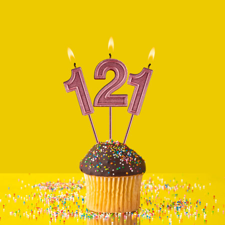 Number 121 candle - Birthday candle with chocolate cupcakeの写真素材