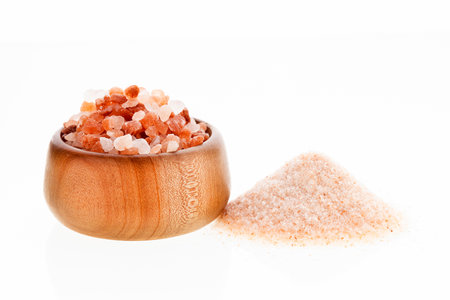 Fine pink Himalayan salt in the bowl - Exotic ingredient for cookingの写真素材