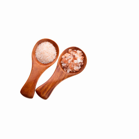 Fine pink salt - Salt in pure crystals in two spoons.の写真素材
