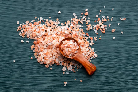 Himalayan pink crystals - Pure coarse salt in a spoonの写真素材