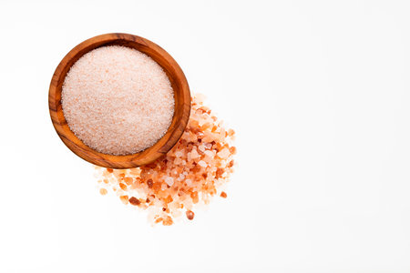 Himalayan pink salt in wooden bowlの写真素材