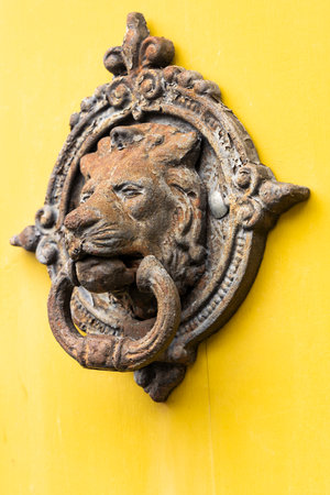 Salamina, Caldas - Colombia. October 6, 2025. Bronze knocker on the main door of a house.の写真素材