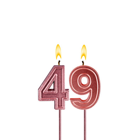 Lit birthday candle - Candle number 49 on white background