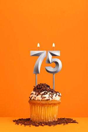 Birthday candle number 75 - cupcakeの写真素材