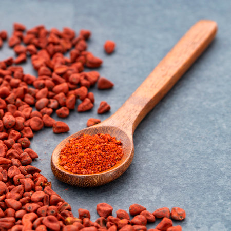 Bixa Orellana - Crushed annatto seeds in the spoon