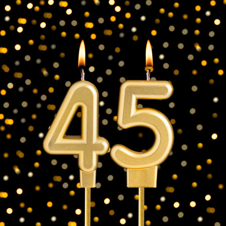 Number 45 on a black background with blurred lights - Birthday card with abstract blurred lights...
