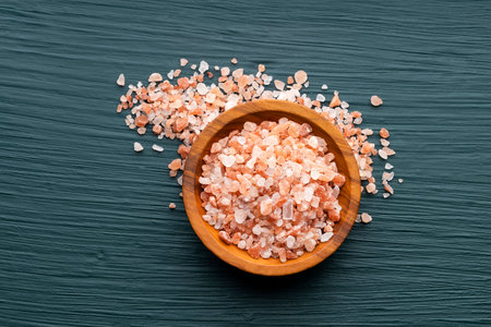 Exotic ingredient for cooking - Himalayan salt crystals in a wooden bowl