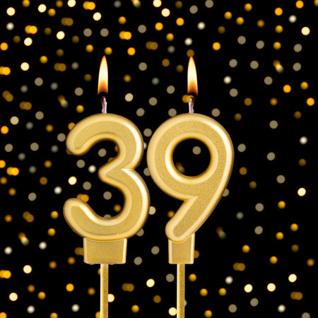 Number 39 on a black background with blurred lights - Birthday card with abstract blurred lights...