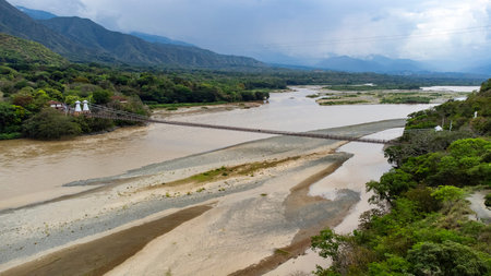 Santa Fe de Antioquia, Colombia. February 15, 2026. Colombian suspension bridge connecting the...