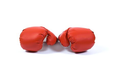 Red boxing gloves on white backgroundの写真素材