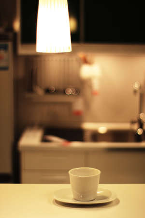 A coffee cup on the barの写真素材