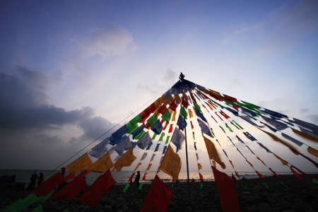 Tibet buddhism flags on the side of Qinghai lake