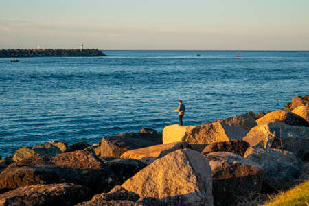 Fishing on Rocksの写真素材