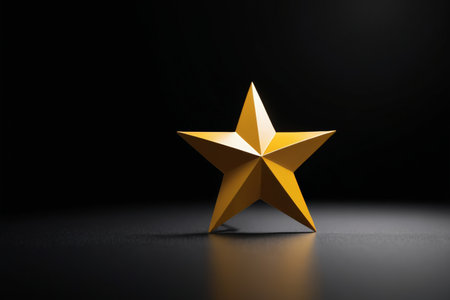The shining of the golden five-pointed star The star of hope against a black backgroundの素材