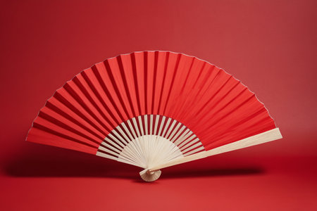 A touch of Chinese red graceful fan dance with oriental charmの素材