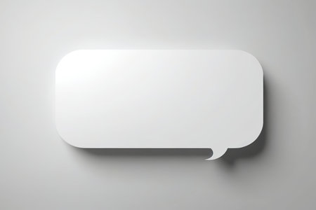 a close up of a white speech bubble on a gray backgroundの素材