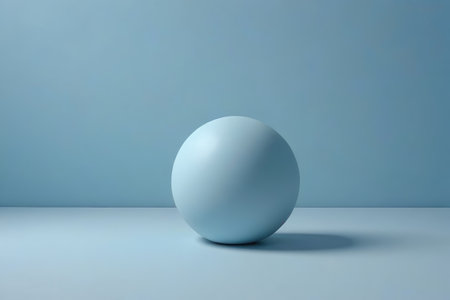 a close up of a white egg on a blue surfaceの素材