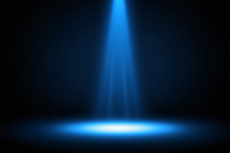 Blue spotlight shines on the stage backgroundの素材