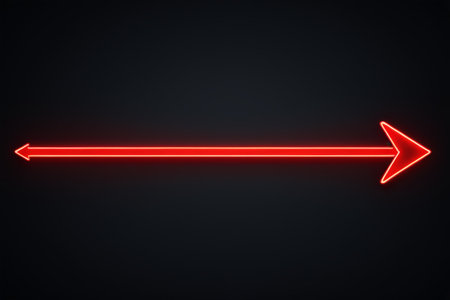 Red glowing arrow on black backgroundの素材