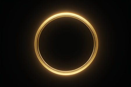 Glowing gold ring on black backgroundの素材