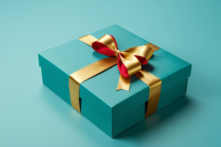 Blue gift box with gold red ribbonの素材
