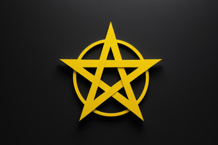 Yellow pentagram graphic on black backgroundの素材