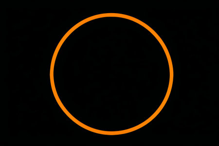 Orange glowing ring on black backgroundの素材