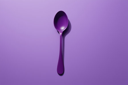 Close up of spoon on purple backgroundの素材
