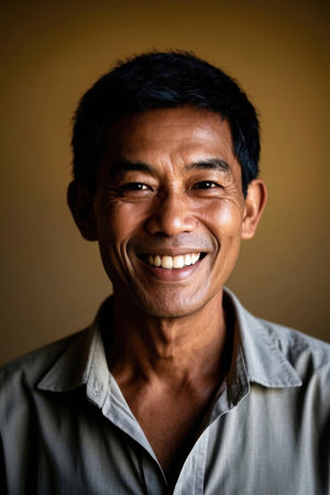 Portrait of smiling middle-aged Asian manの素材