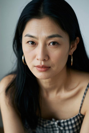 Asian women portrait close-up with firm eyesの素材