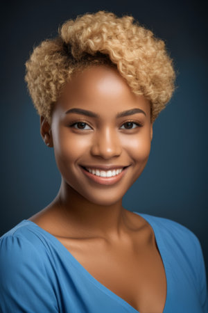 Portrait of confident and elegant African American woman, blonde and blue-eyed attractive woman smilingの素材