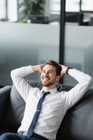 Relaxing business man rests on sofaの素材