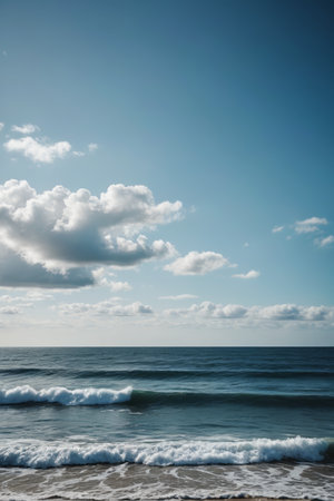 there is a person walking on the beach with a surfboardの素材