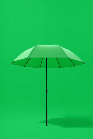 Green parasol against a green screen backgroundの素材