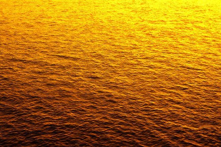 Golden sea surface sunlit sceneの素材