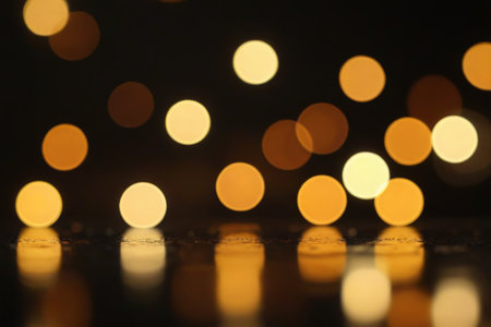 Blurred luminous spot background image at nightの素材