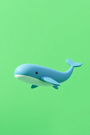 Blue cartoon whale with green backgroundの素材